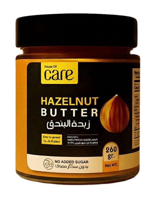 Jar of hazelnut butter with 'House of Care' branding on a white background
