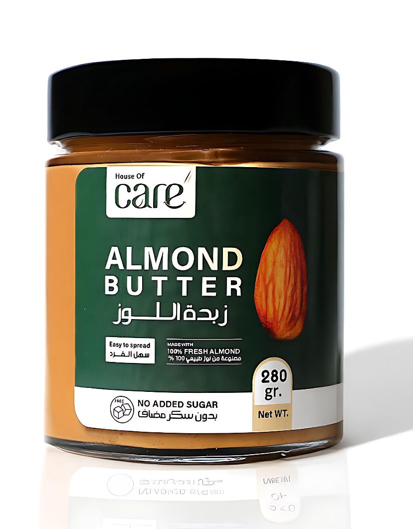 Jar of almond butter with a green label on a white background