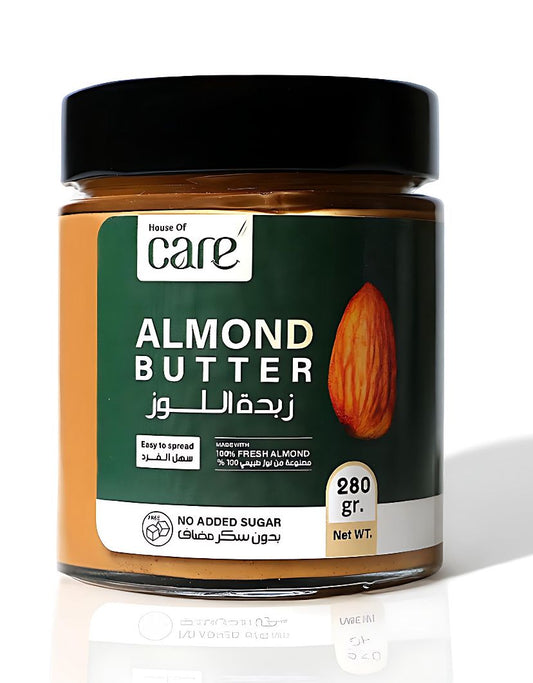 Jar of almond butter with a green label on a white background
